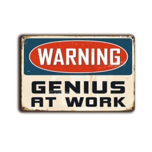Metalen wandbord Warning Genius at work