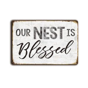 Metalen wandbord Our nest is Blessed
