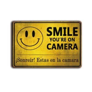 Metalen wandbord Smile you're on camera